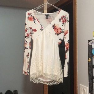 Long sleeve white floral top.